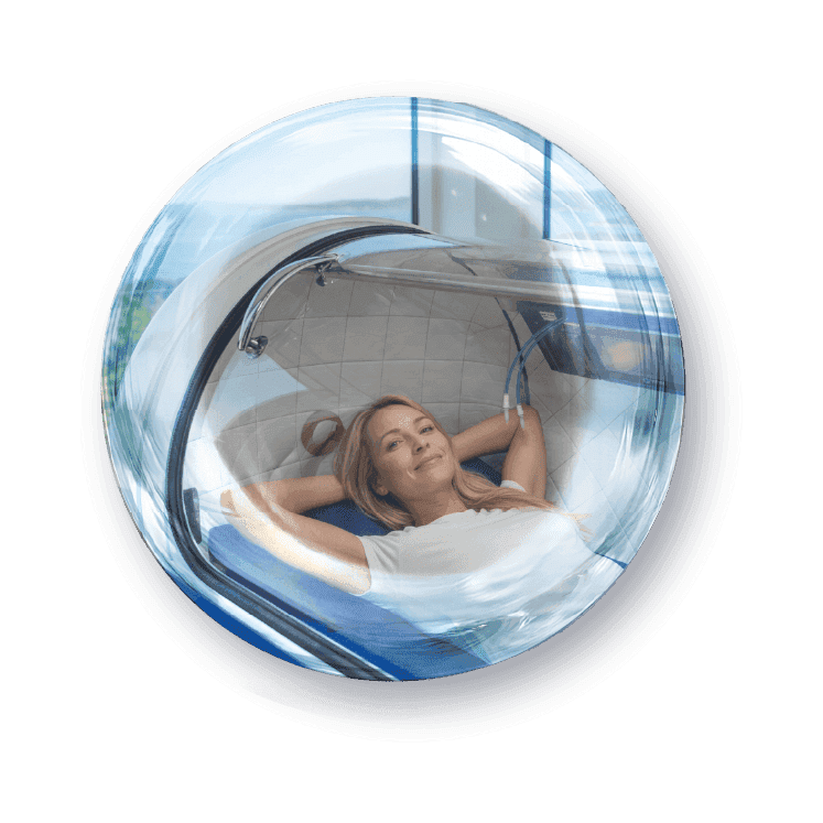 Person som ligger bekvämt i en hyperbar tryckkammare